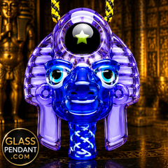 Hand-blown heady glass pharoah young tut pendant by @dannycampglass. Featuring an encased star shaped opal. Hanging from a paracord necklace.