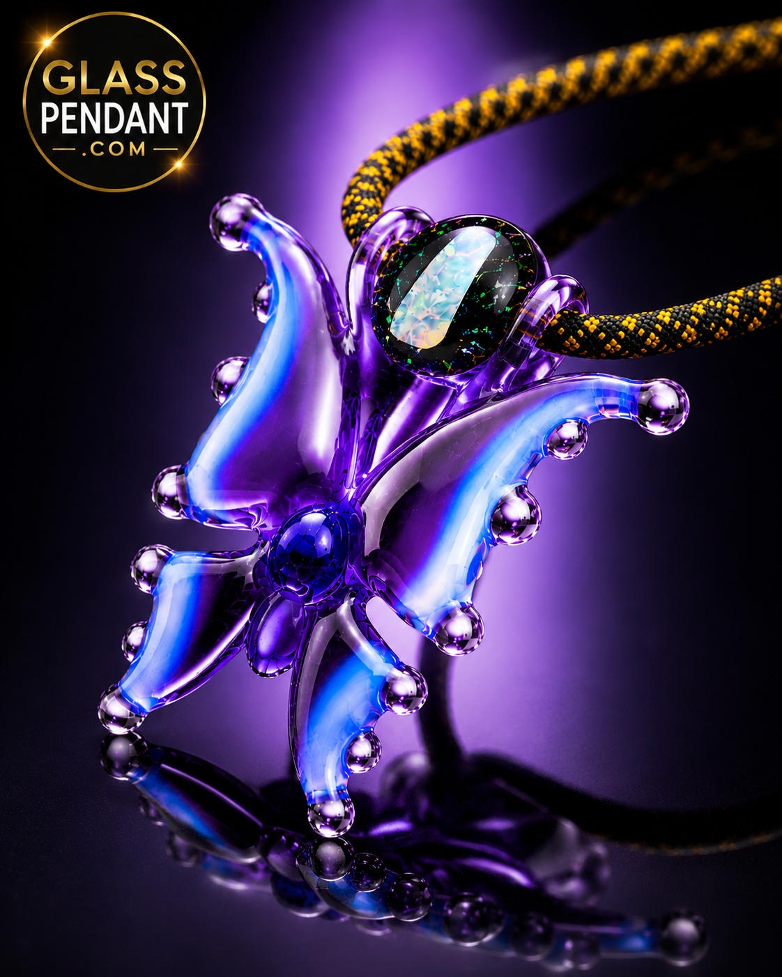 Hand-blown heady glass butterfly pendant by @diligent_glass. Featuring an encased opal crushed opal marble, purple lollipop glass, moonstone glass. Hanging from a paracord necklace.