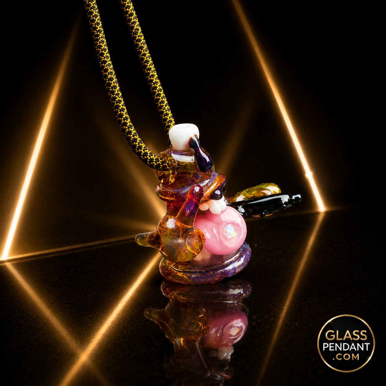 Hand-blown heady glass spray paint can pendant by @gl_asshole. Featuring amber purple glass. Hanging from a paracord necklace. 