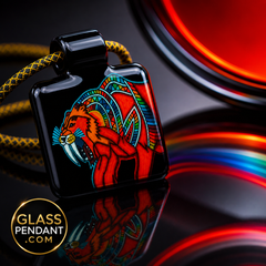 Hand-blown heady glass sabertooth tiger pendant by @kevinmurrayglass. Hanging from a paracord necklace. 