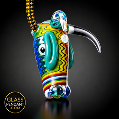Hand-blown heady glass bull pendant by @kmanglass. Featuring third eye opal, rainbow wig wag linework. Hanging from a paracord necklace.