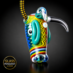Hand-blown heady glass bull pendant by @kmanglass. Featuring third eye opal, rainbow wig wag linework. Hanging from a paracord necklace.