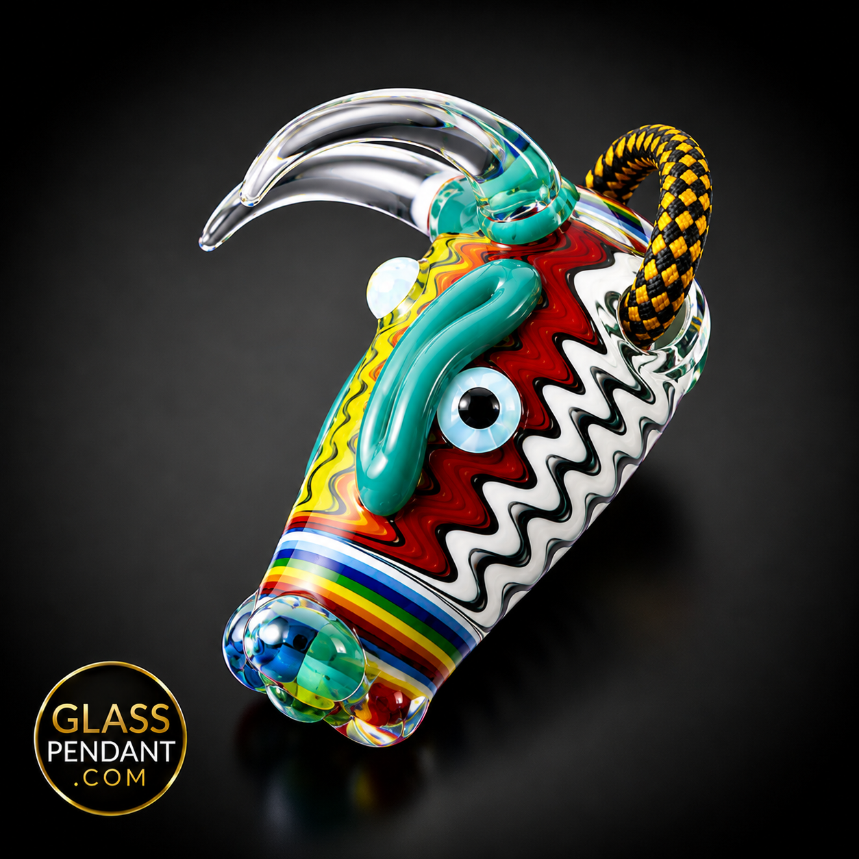 Hand-blown heady glass bull pendant by @kmanglass. Featuring third eye opal, rainbow wig wag linework. Hanging from a paracord necklace.