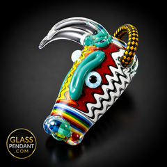 Hand-blown heady glass bull pendant by @kmanglass. Featuring third eye opal, rainbow wig wag linework. Hanging from a paracord necklace.