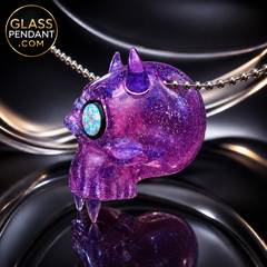 Hand-blown heady glass kali skull pendant by @leebrodee. All crushed opal. Featuring molten aura glass, and 2 encased opal eyes, and fangs. Hanging from a paracord necklace.