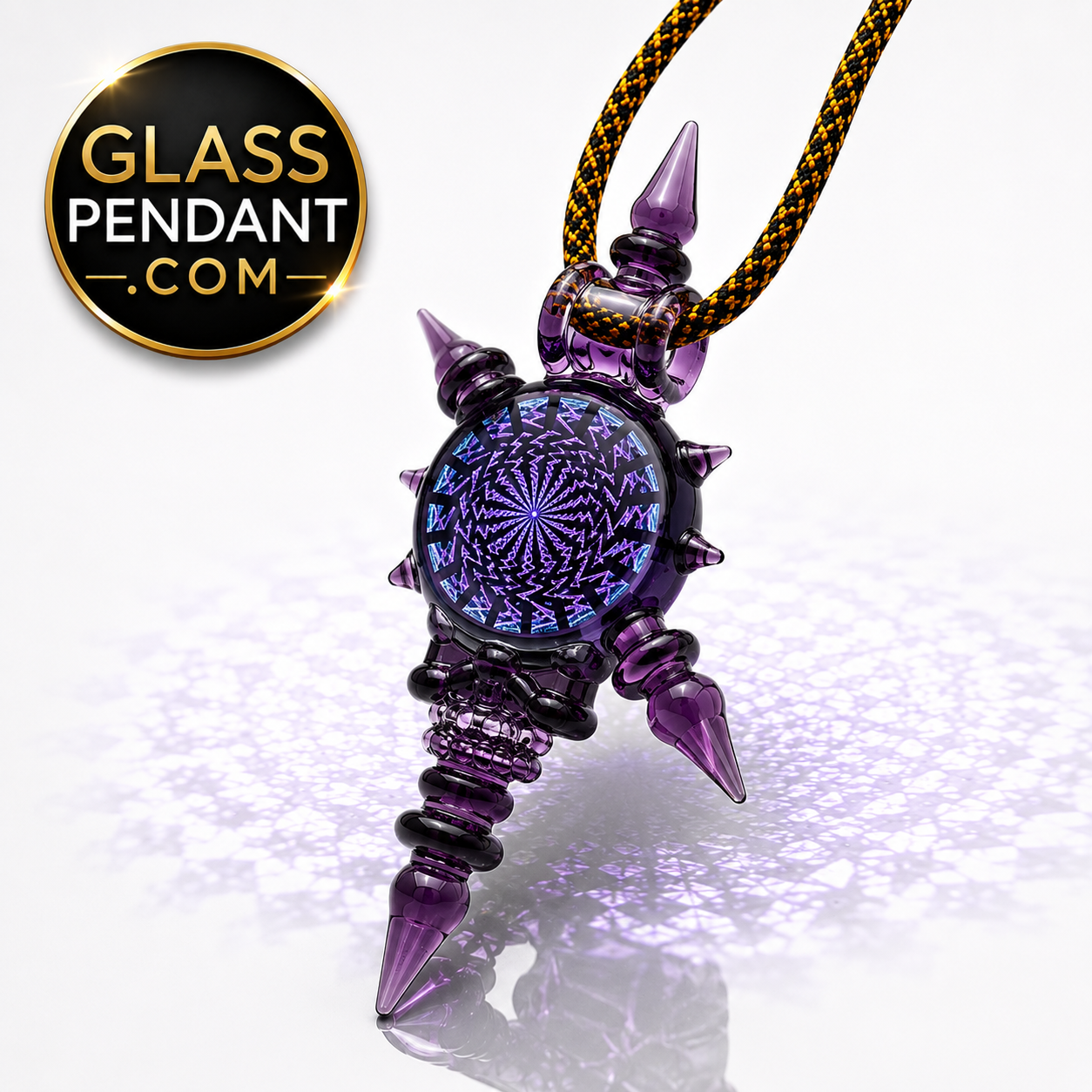 Hand-blown heady glass spiked deadhead skull pendant by @neebsglass. Featuring dichroic sacred geometry, and purple lollipop glass. Hanging from a paracord necklace.